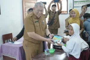 Sekda Asahan Launching Gerakan Serentak Uji Coba Makanan Gratis Bagi Peserta Didik di Kabupaten Asahan